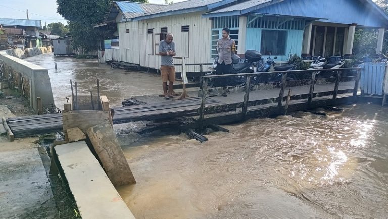 Banjir Kembali Melanda Guntung Bhabinkamtibmas Himbau Warga Tingkatkan Kewaspadaan