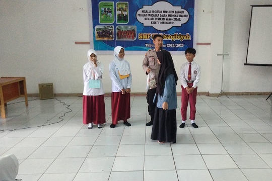 Bhabinkamtibmas Belimbing Brigpol Ilham Hadiri Masa Pengenalan Lingkungan Sekolah di SD Atsaqibyah